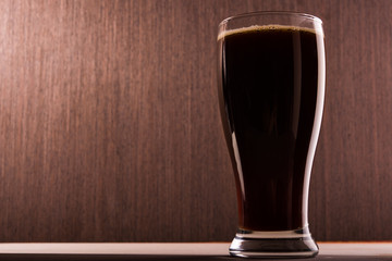Dark beer into glass