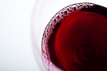 Closeup of wine bubbles in glass