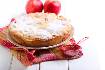 Apple cake with icing sugar