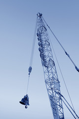 Crawler crane in the construction site