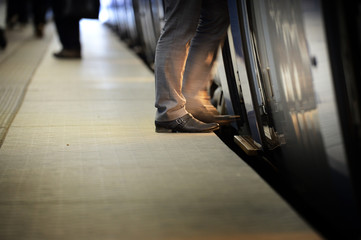 Suit entering eveing train