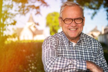 Portrait of an attractive senior in countryside