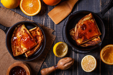 Homemade french crepes with orange syrup.