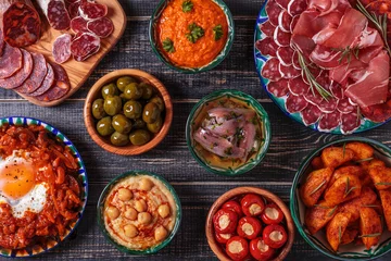 Foto op Canvas Typical spanish tapas concept, rustic style,  top view. © tbralnina
