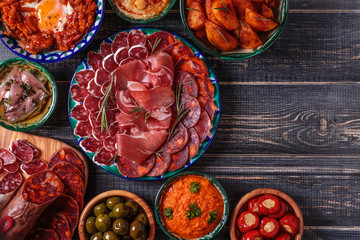 Typical spanish tapas concept, rustic style,  top view.