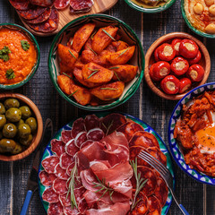 Typical spanish tapas concept, rustic style,  top view.