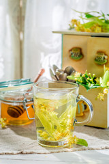 Sweet tea with honey in summer day