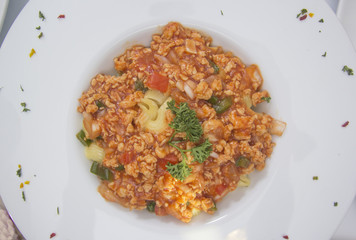 Macaroni with tomato chicken sauce