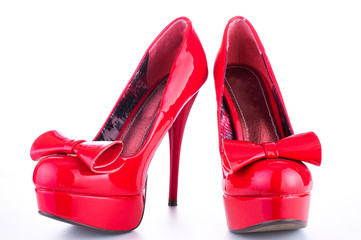 stylish fashion red female shoes on a white background