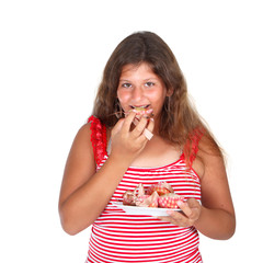 a girl ieating a cupcakes