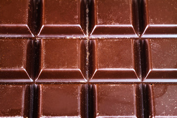 Dark chocolate bar, top view, close-up