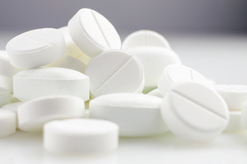 Fototapeta na wymiar Close-up. Pharmacy theme, white medicine tablets antibiotic pills.