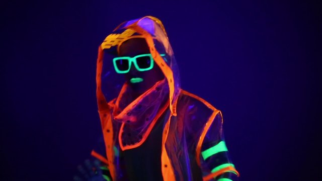 The man in the neon costume
