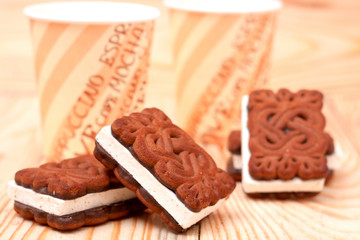 zephyr cookie with tea on wooden background