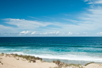 View on Dunes and Indian Ocean tropical beach with waves, Tofo, Mozambique