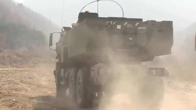 HIMARS mobile rocket launcher system is fired from the back of trucks.