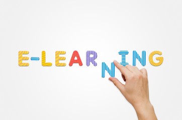 Hand put the word e-learning with magnetic letters
