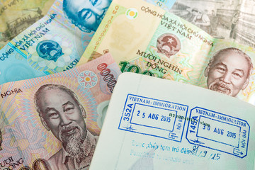 Visa passport stamp from vietnam and Vietnamese money (Dong)