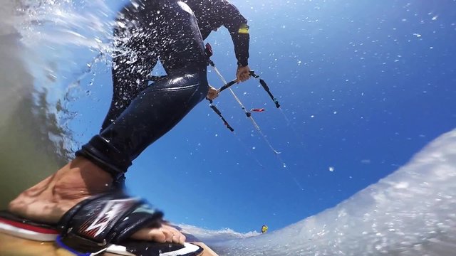 Kitesurfaction in North sea of St.Peter-Ording, Germany