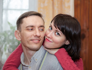  couple on   couch at home.