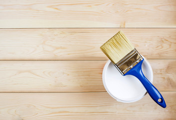 brush and paint on wooden boards