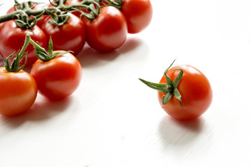 Tomatoes on white background