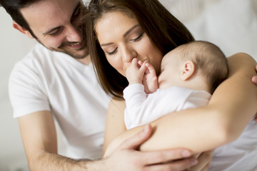 Happy family with newborn baby