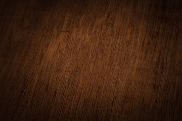 Grunge wooden background with moody spot lighting
