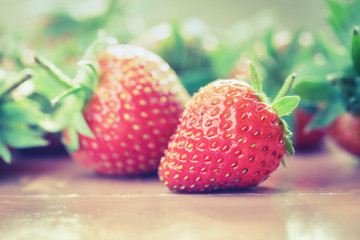 Red strawberry place on the plate, Vintage tone