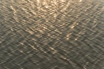 seamless texture warm color shining sunset water surface