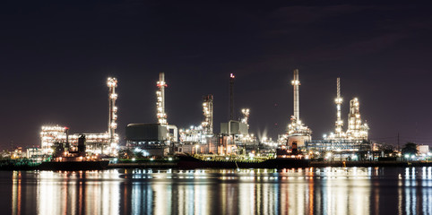 Oil refinery industry plant at night scene