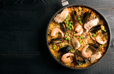 Traditional seafood paella in the pan