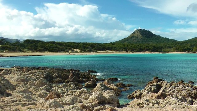 Majorca, Cala Agulla, a rocky and sandy beach with emerald water