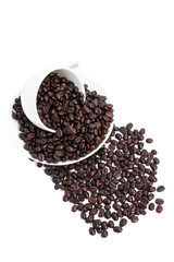 Coffee beans in coffee mug isolated on white background