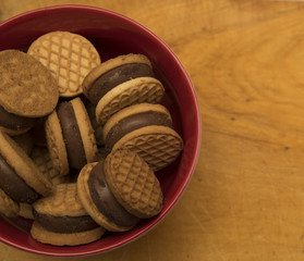 bowl biscuits on woden surfacebowl biscuits on woden surface