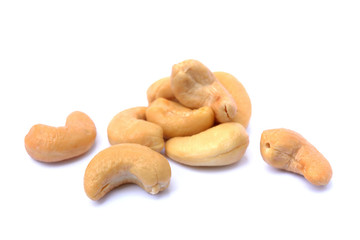 Peeled salted cashews isolated on a white background