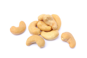 Peeled salted cashews isolated on a white background