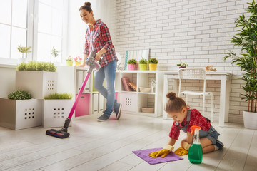 family cleans the room