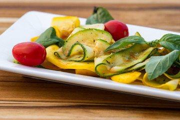 zucchini and tomato with basil