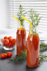 Natural and fresh tomato juice in small bottles