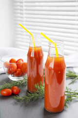 Natural and fresh tomato juice in small bottles
