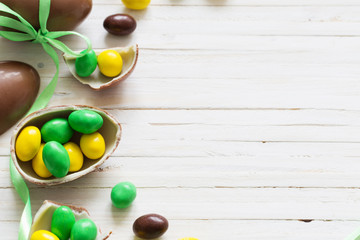 Chocolate Easter Eggs Over Wooden Background
