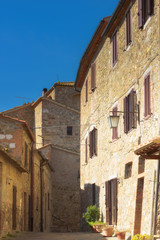 Fototapeta na wymiar Streets of tiny ancient town in Tuscany, Contignano.