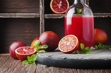 Sweet juice with red oranges and mint