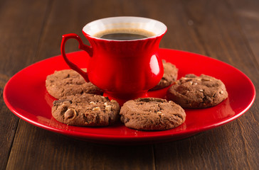Coffee cup and amaretti biscuits on wooden background. top view