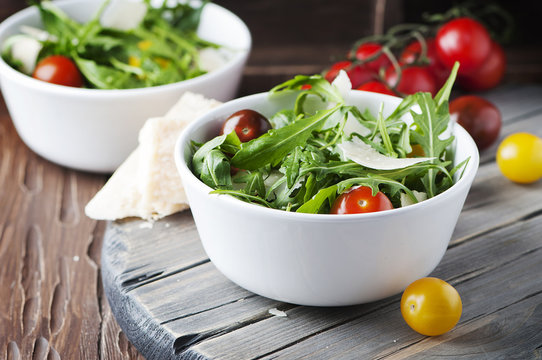 Healthy Salad With Rocket, Tomato And Parmesan Cheese