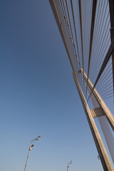 bridge steel ropes constructions on sky  background