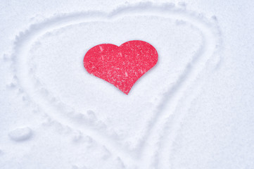 Paper heart in the snow