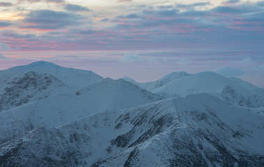 Obraz premium Colorful mountain sunset panorama at winter in Western Tatras