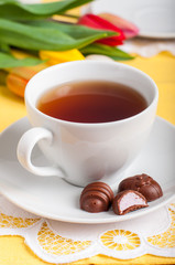 A Cup of Tea with Easter Egg Shaped Chocolate Candies